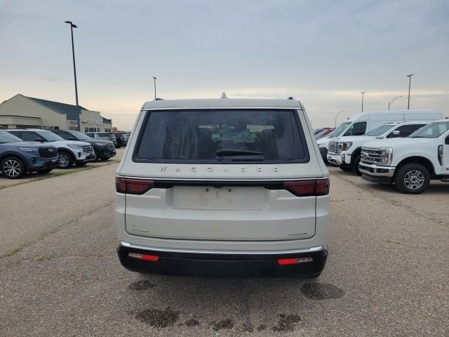 Used 2022 White Pearl Jeep Series III image 25