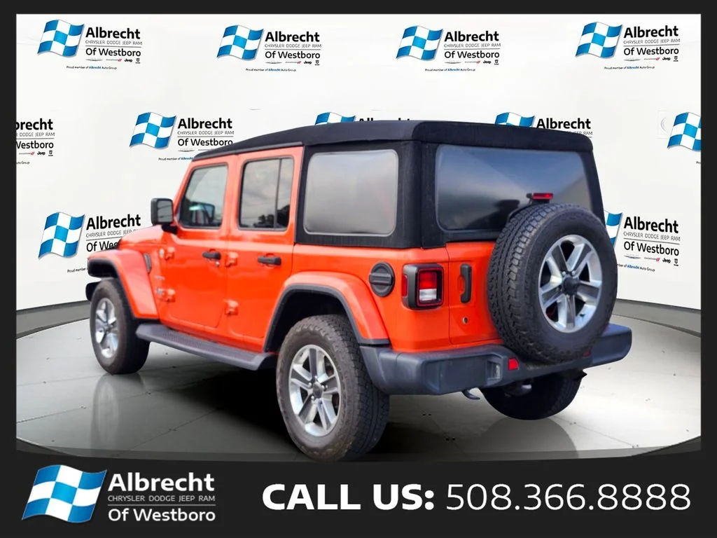 Used 2020 Orange Jeep Unlimited Sahara image 3