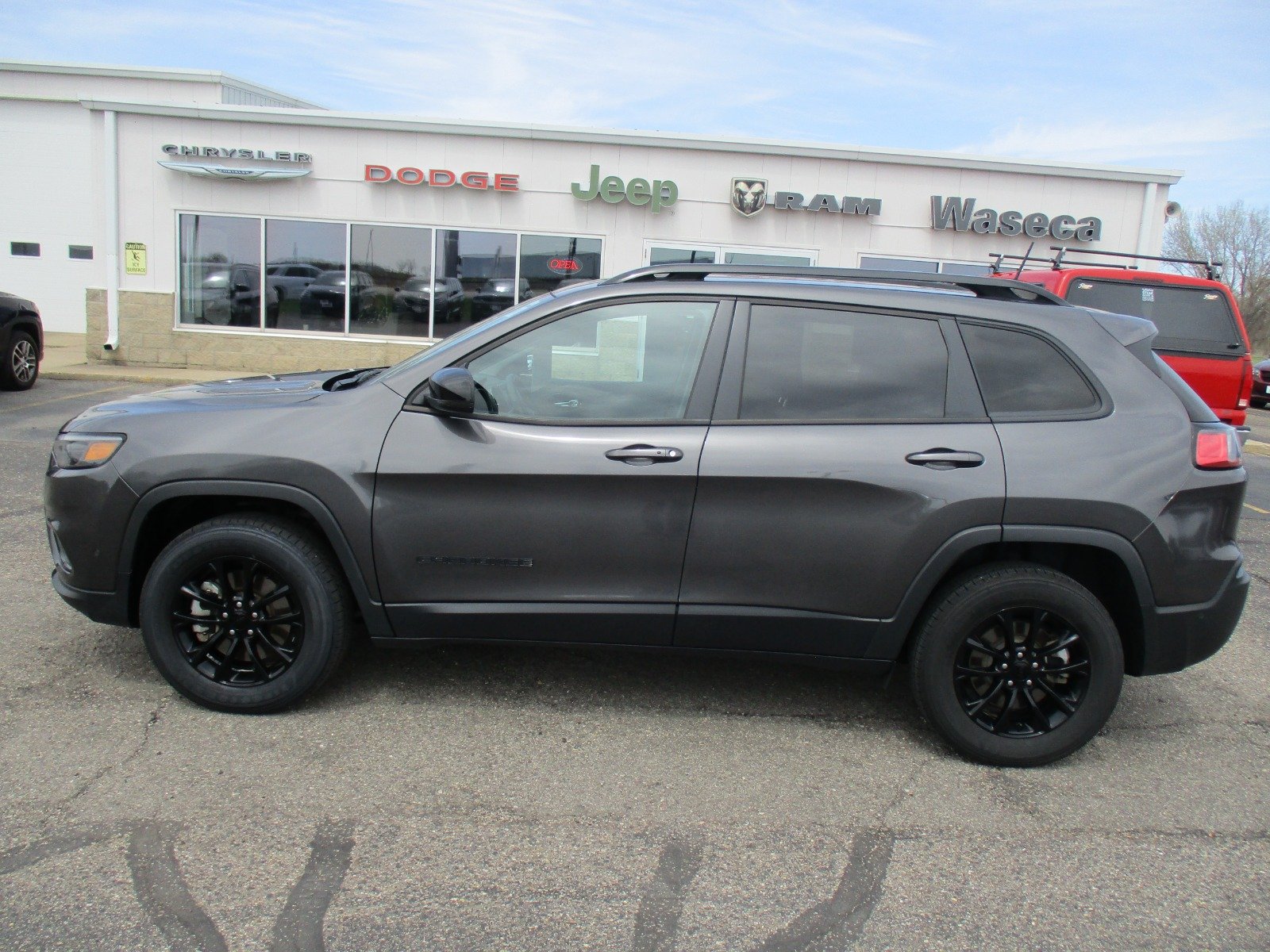 Used 2023 Jeep Cherokee Altitude Lux with VIN 1C4PJMMBXPD114296 for sale in Waseca, Minnesota