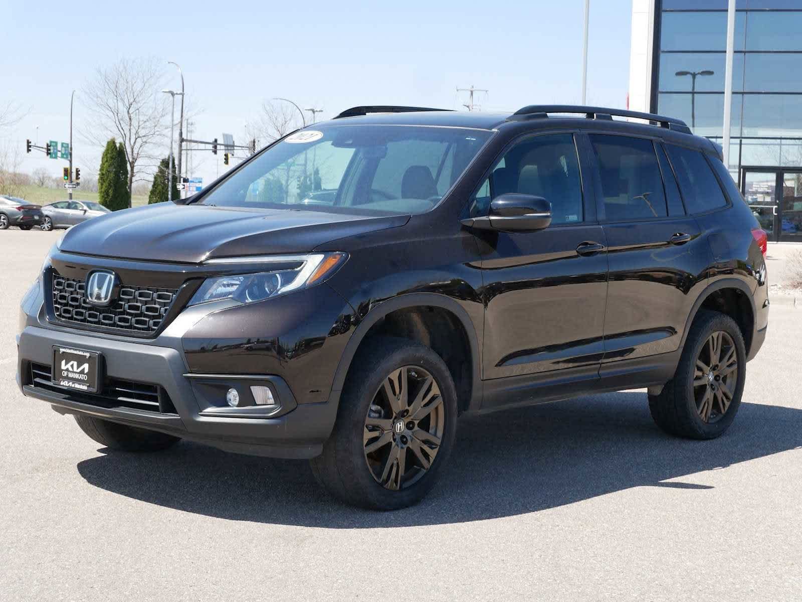 Used 2021 Honda Passport EX-L with VIN 5FNYF8H54MB008139 for sale in Mankato, Minnesota