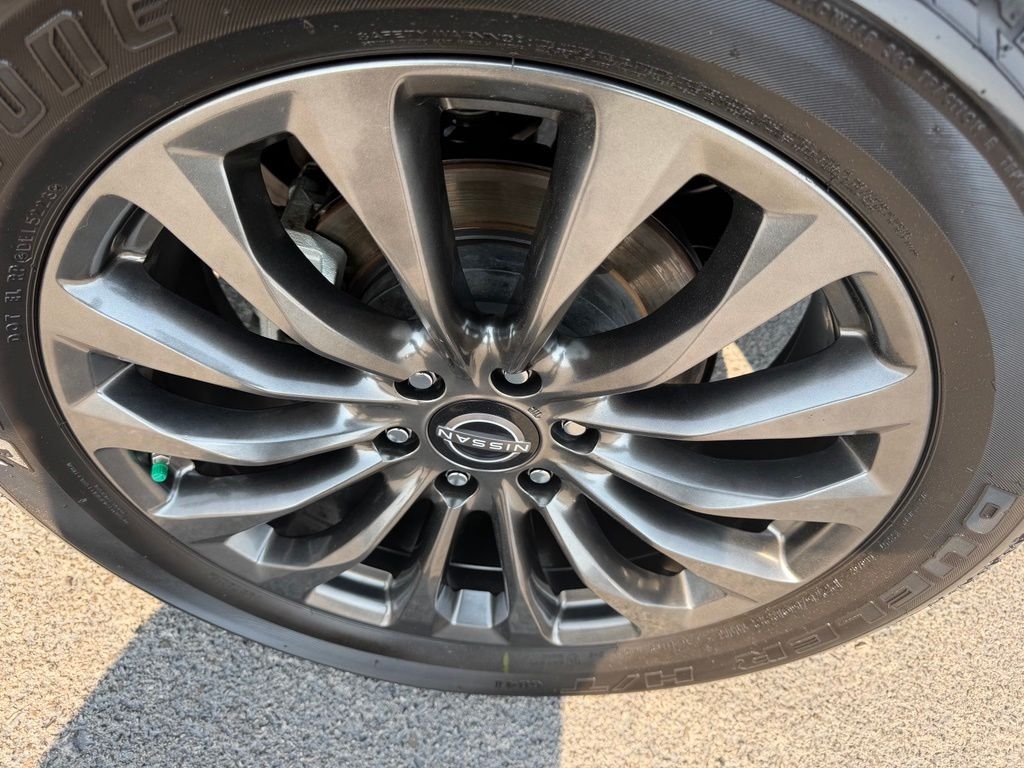 Certified Used 2024 Black Nissan Platinum image 12