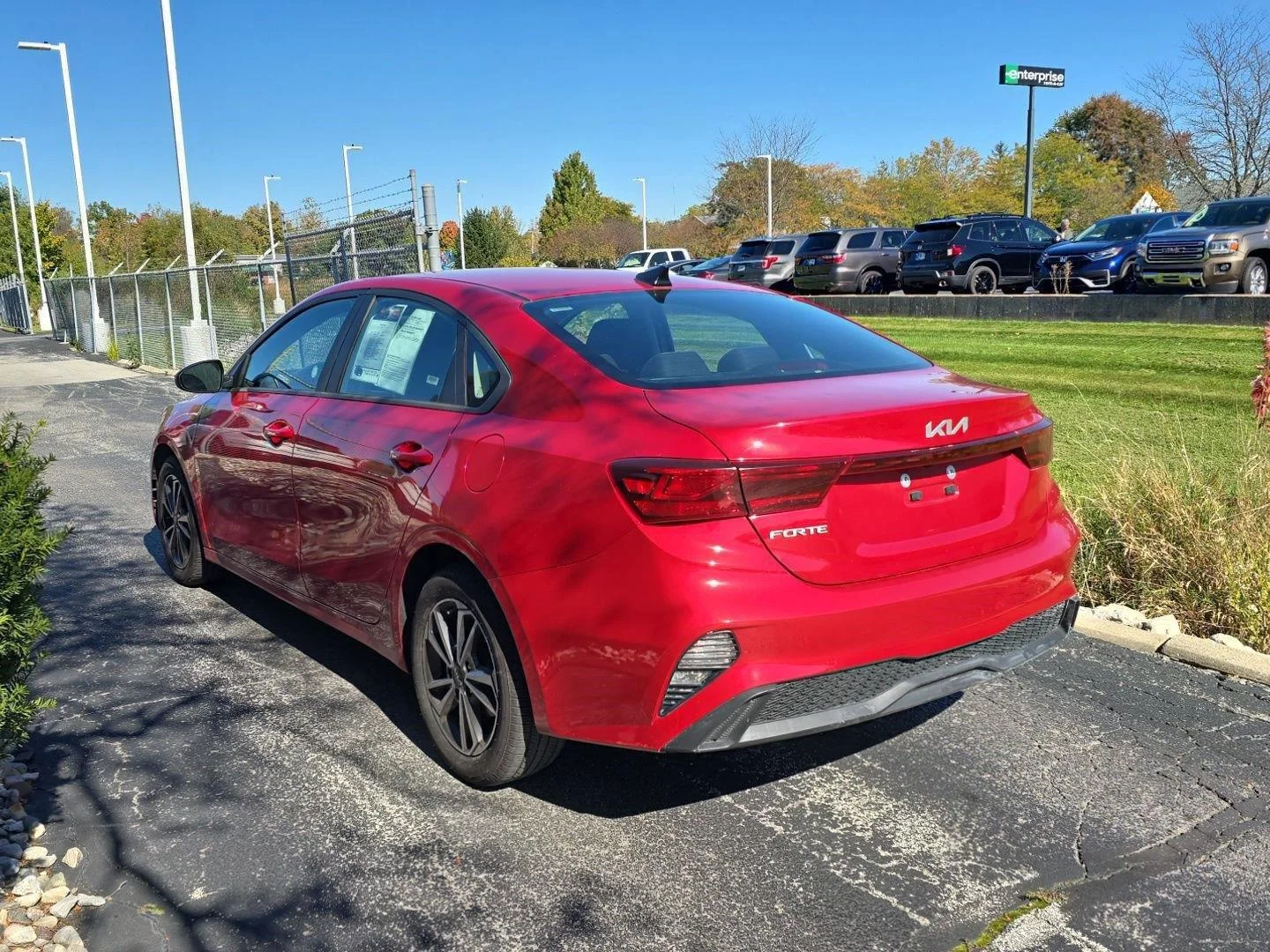 Used 2024 Currant Red Kia LXS image 7