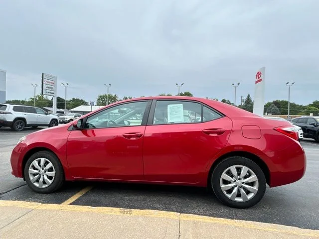 Used 2016 Barcelona Red Metallic Toyota LE image 6