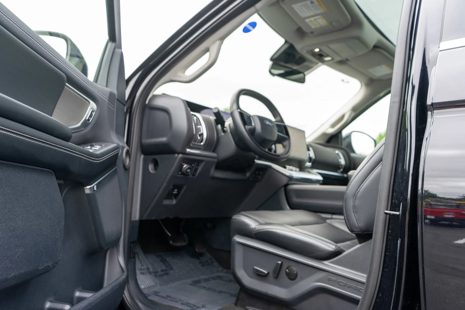 Used 2025 Black Metallic Ford Platinum image 16