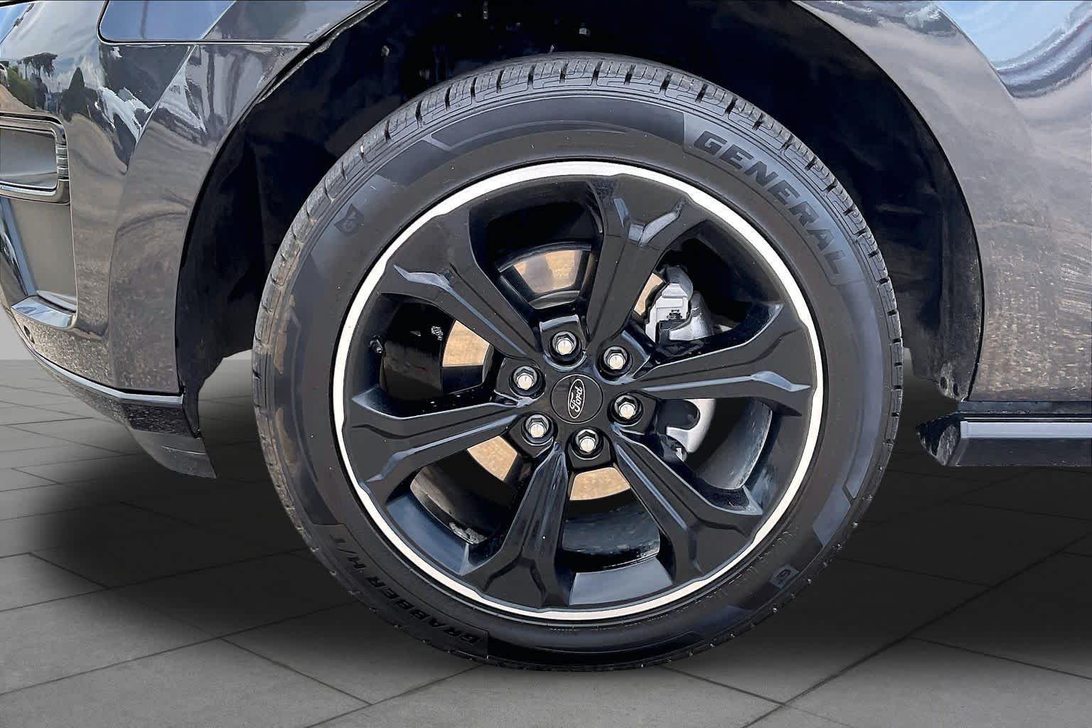 Used 2024 Dark Matter Gray Metallic Ford Limited image 11
