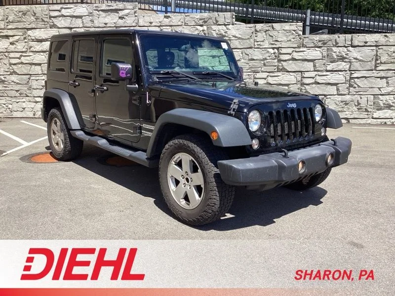 Used 2017 Black Clearcoat Jeep Unlimited Sport image 1