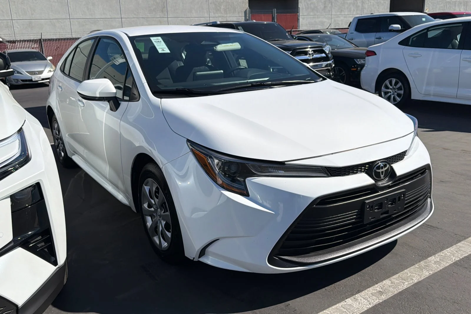 Used 2025 White Toyota LE image 2