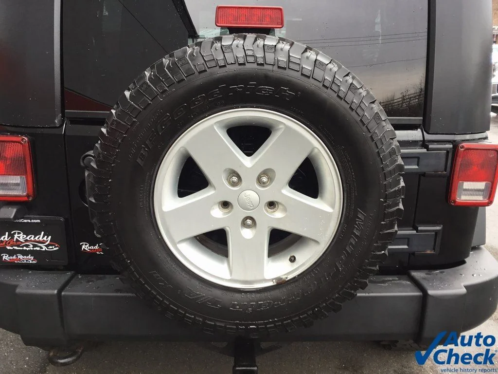 Used 2010 Black Jeep Unlimited Sport image 25
