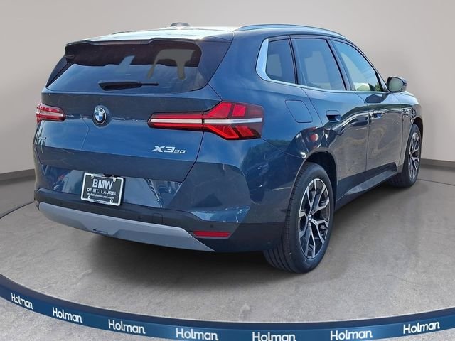 New 2026 Arctic Race Blue metallic BMW 30 xDrive image 4