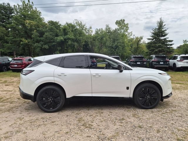 New 2027 Everest White Pearl TriCoat Nissan Dark Armor image 3