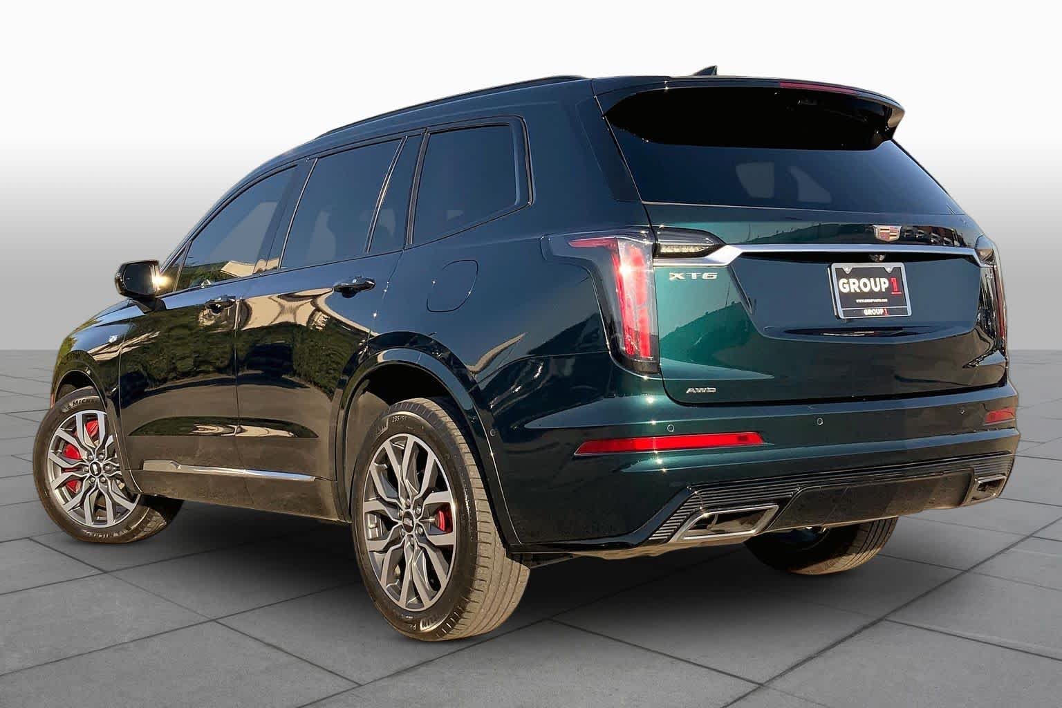 Used 2024 Emerald Lake Metallic Cadillac AWD Sport image 12