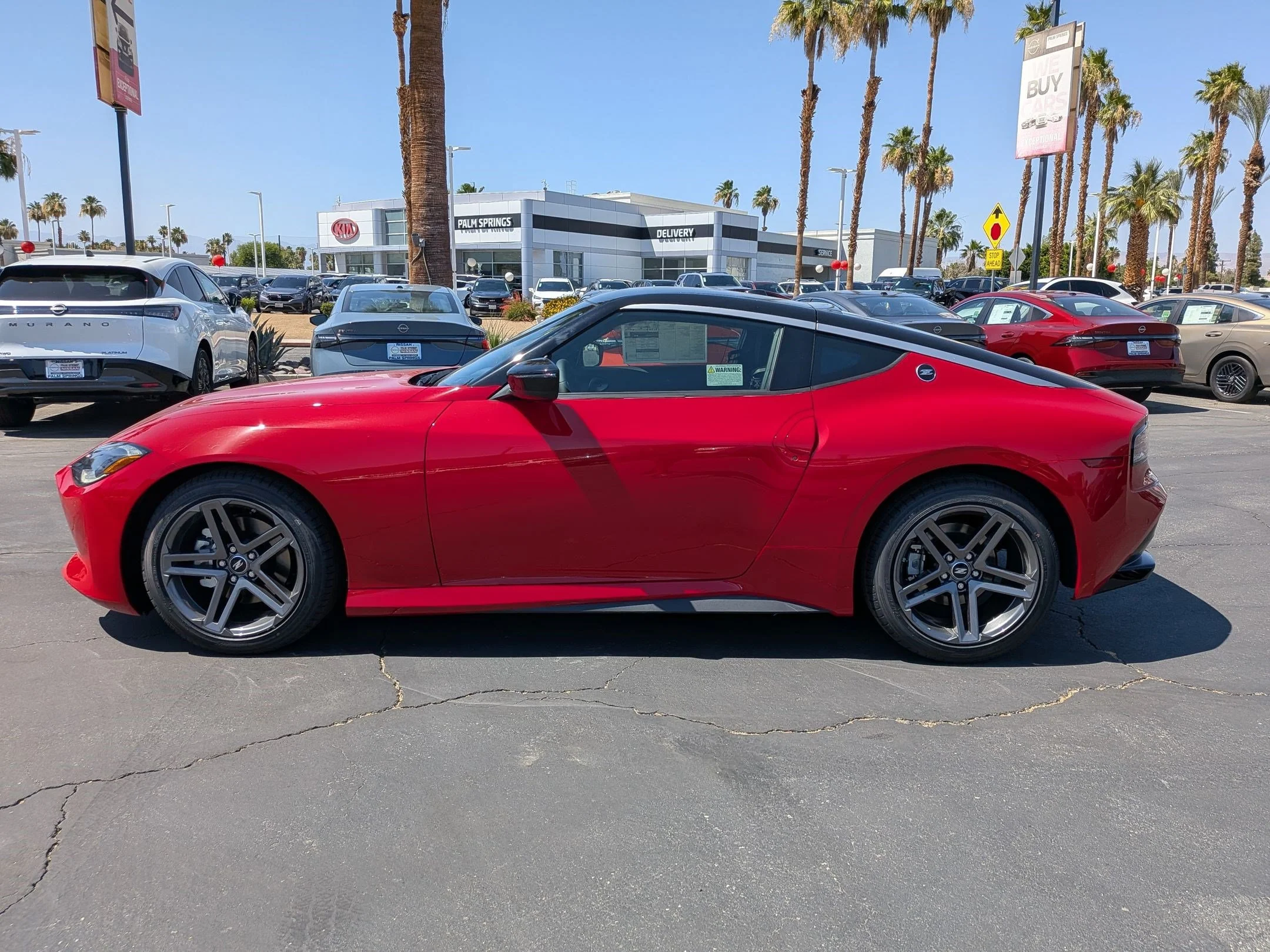 New 2026 Solid Red/Super Black Nissan Sport image 3