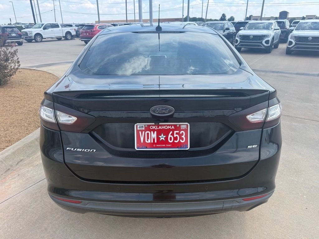 Used 2016 Shadow Black Ford SE image 4