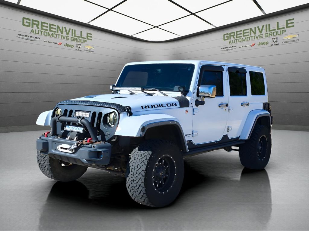 Used 2014 Jeep Wrangler Unlimited Rubicon X with VIN 1C4BJWFG3EL202043 for sale in Greenville, AL