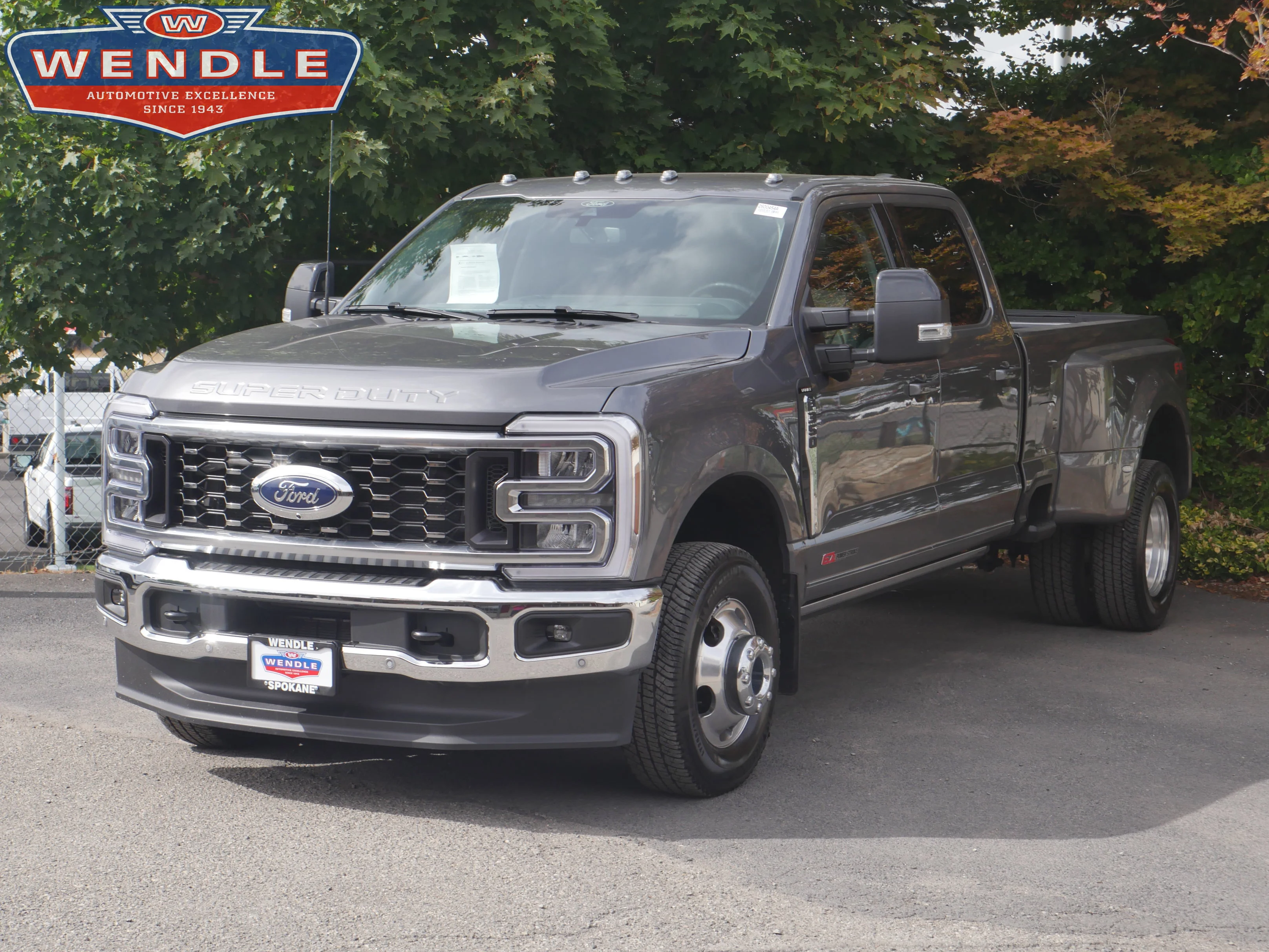 Certified Used 2024 Carbonized Gray Metallic Ford LARIAT image 1