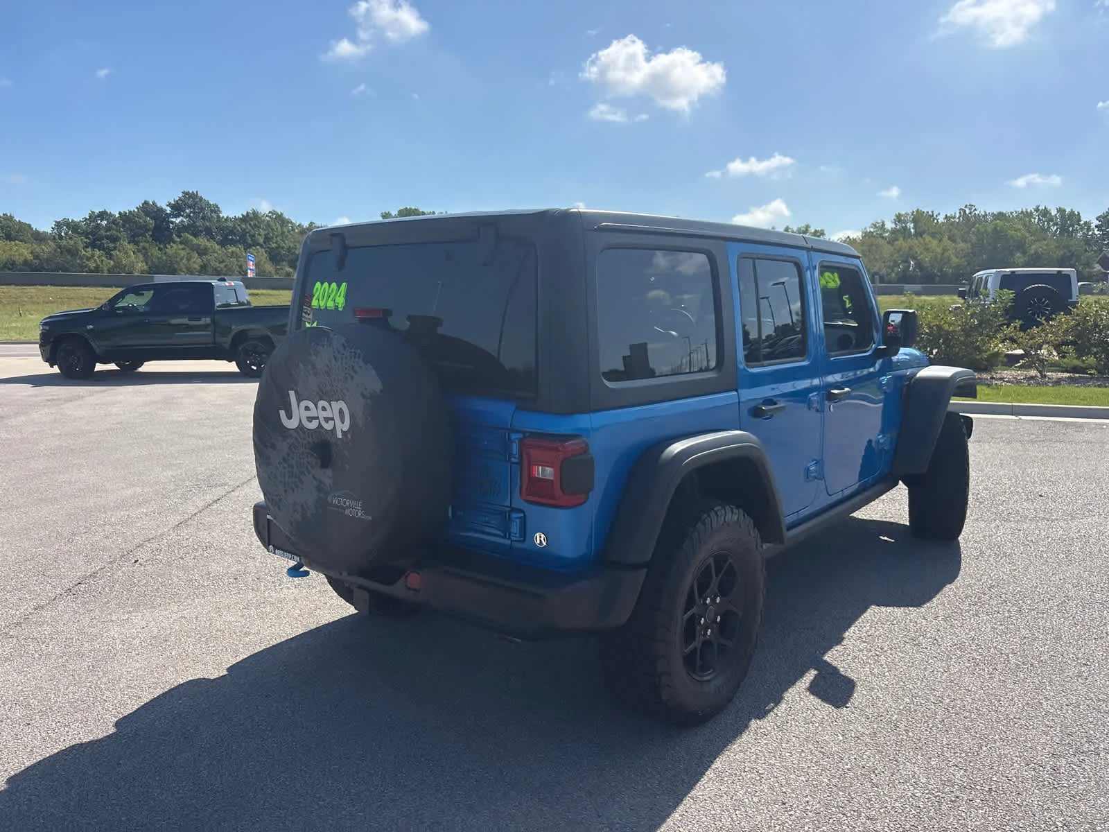Used 2024 Hydro Blue Pearlcoat Jeep Willys image 10