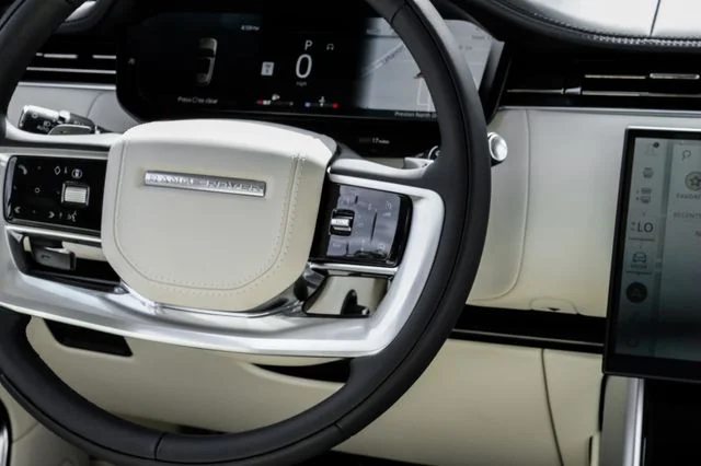 New 2026 White Land Rover SE image 24