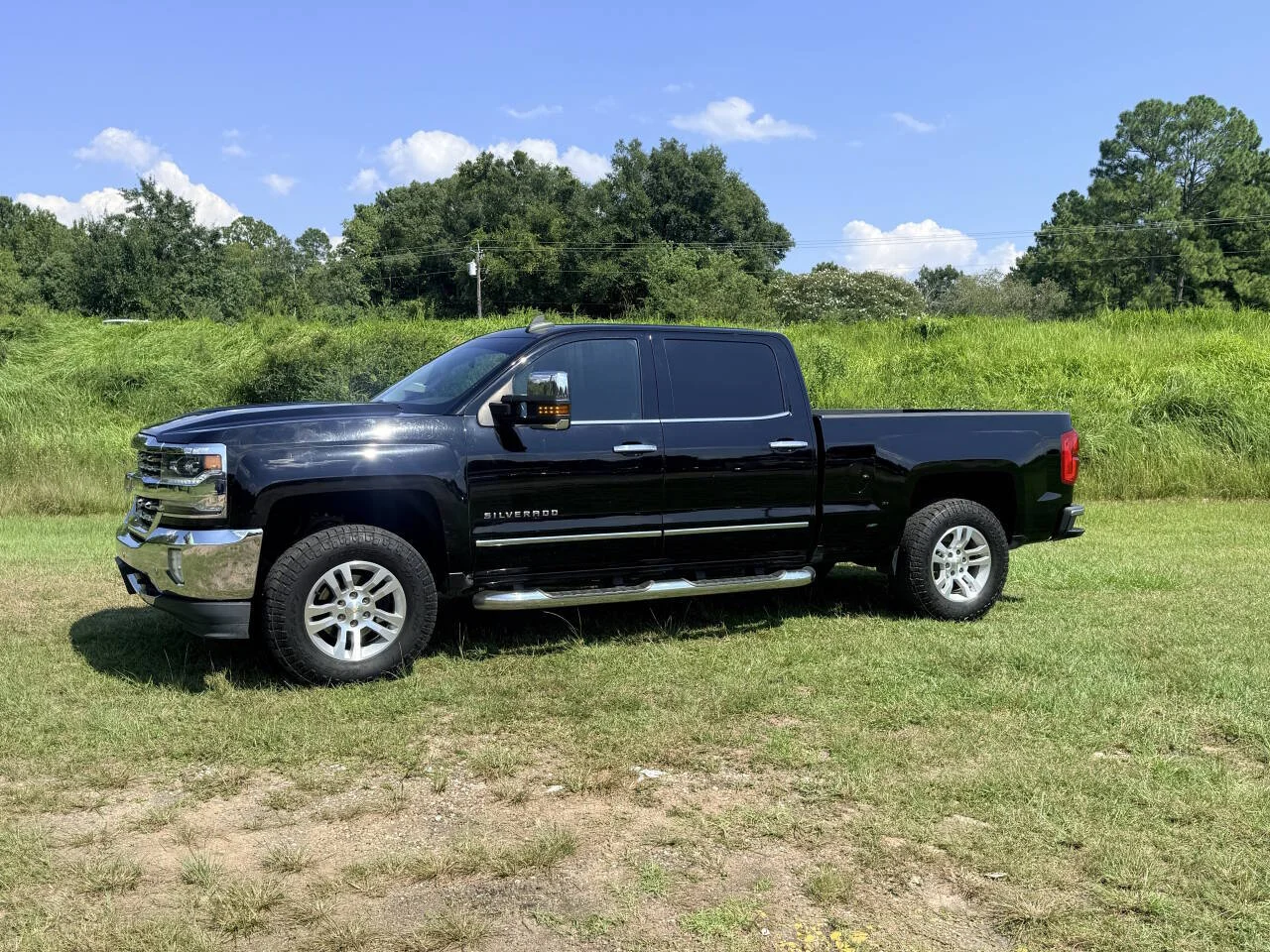Used 2017 Black Chevrolet LTZ 4x4 4dr Crew Cab 6.5 ft. SB image 1