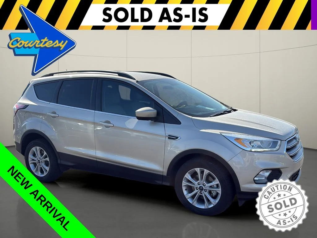 Used 2017 Gold Ford SE image 1