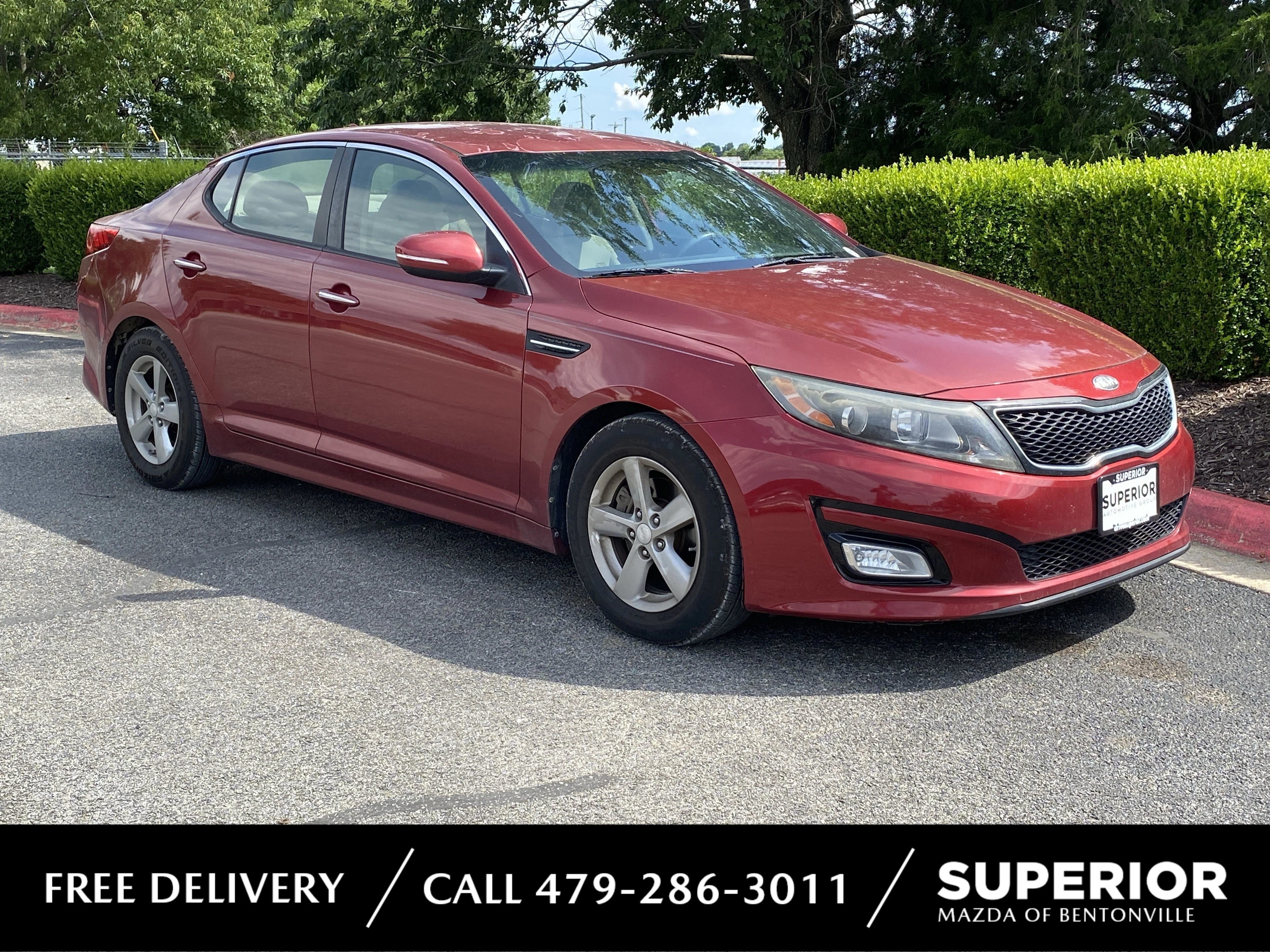 Used 2014 Remington Red Metallic Kia LX image 1