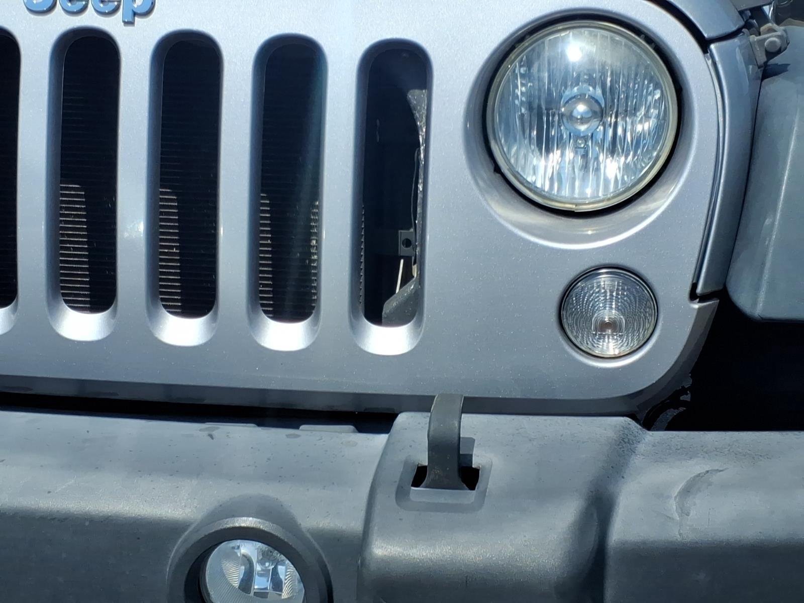 Used 2015 Billet Silver Metallic Clearcoat Jeep Sport image 14