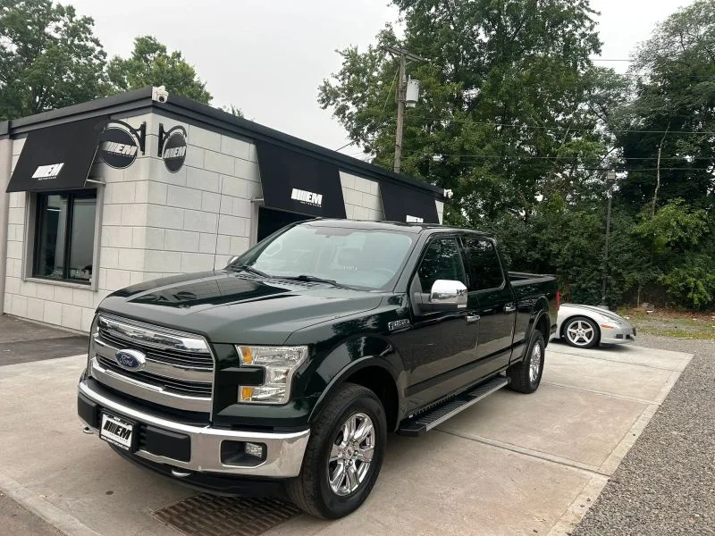 Used 2016 Green Ford Lariat Pickup 4D 6 1/2 ft image 1