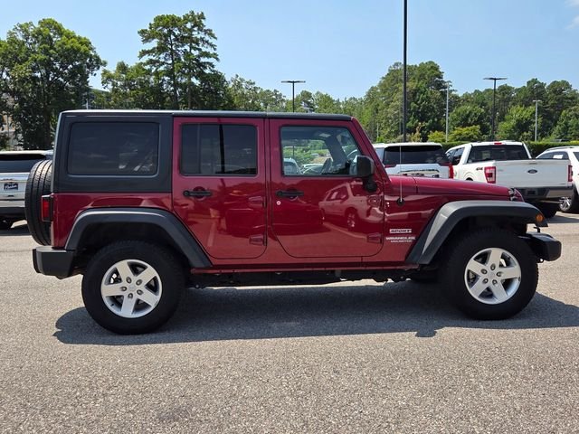 Used 2013 Red Jeep Unlimited Sport image 6