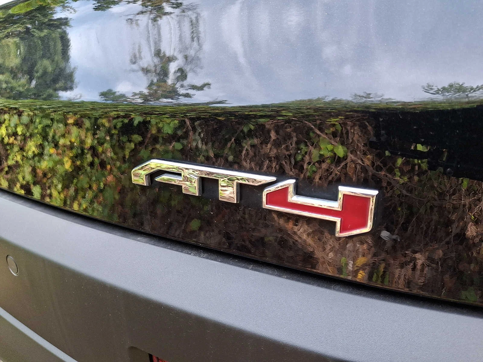 Used 2023 Ebony Twilight Metallic GMC AT4 image 5