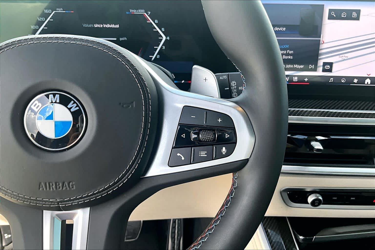 Certified Used 2024 Black Sapphire Metallic BMW M60i image 21
