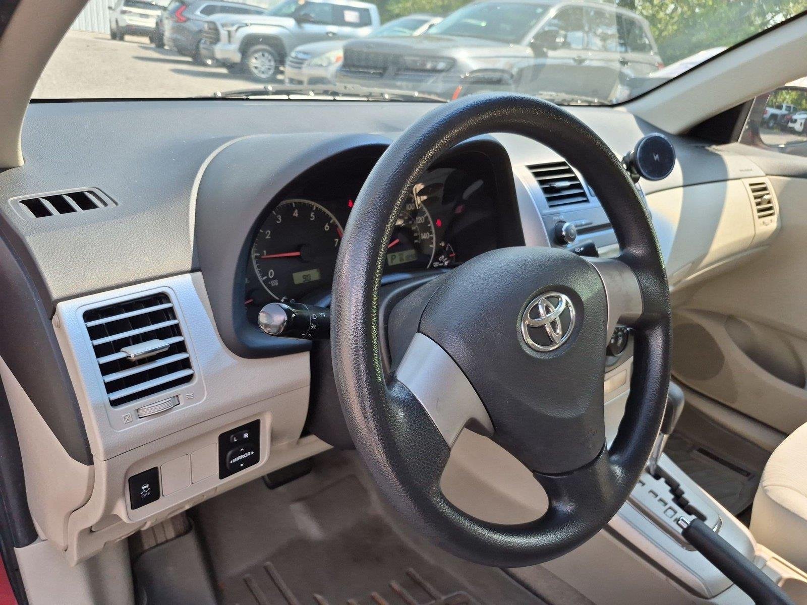 Used 2011 Barcelona Red Metallic Toyota LE image 18