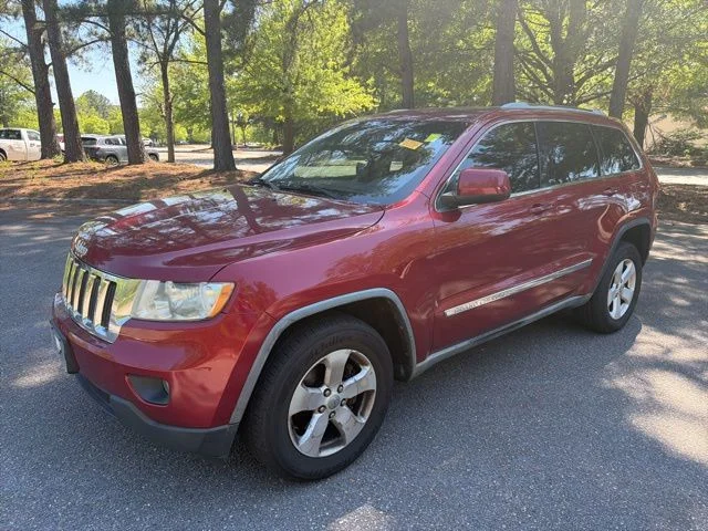 Used 2012 Red Jeep Laredo image 1