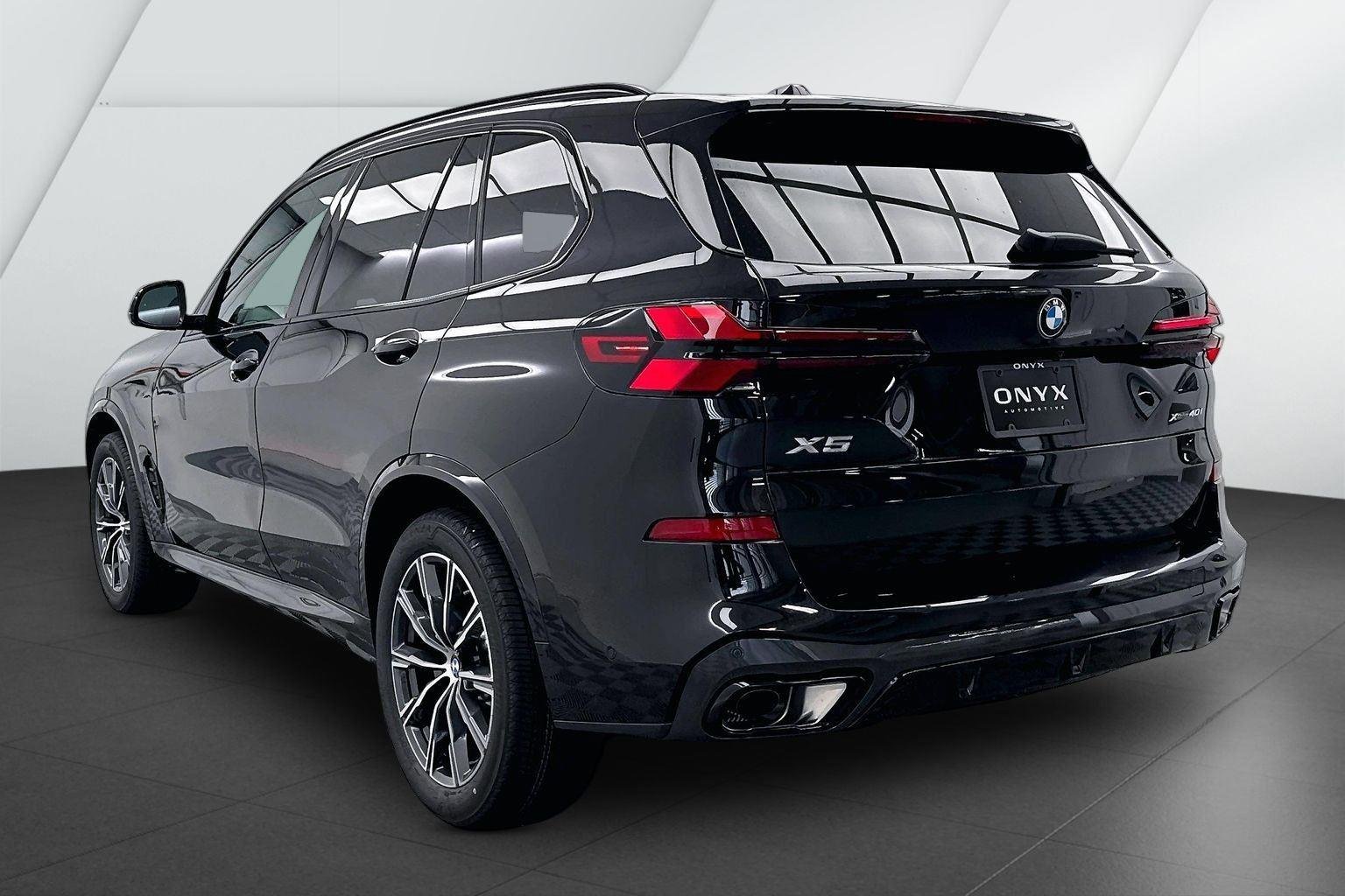 New 2026 Black Sapphire Metallic BMW xDrive40i image 9
