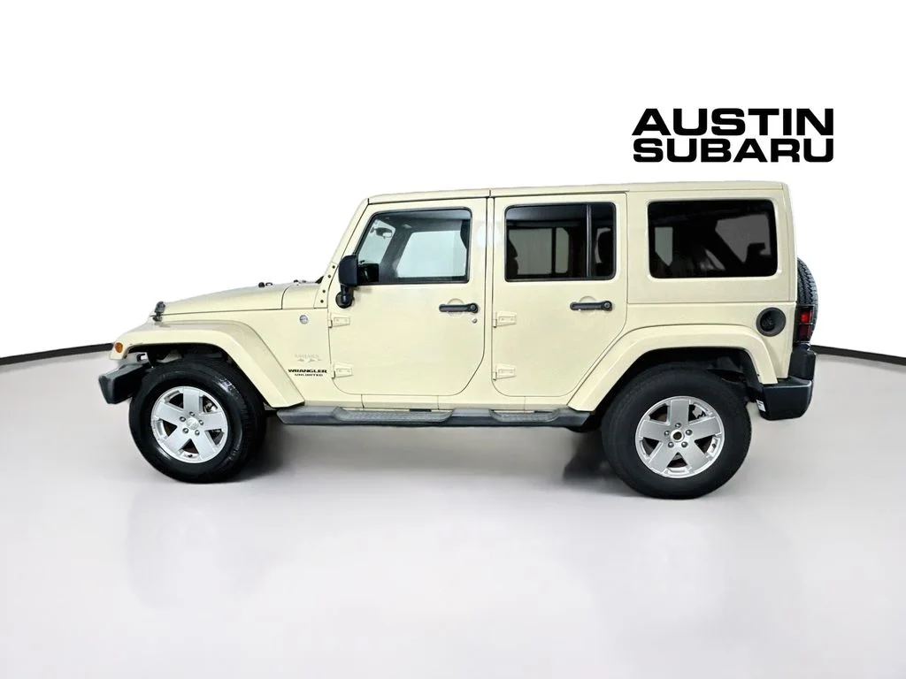 Used 2012 Beige Jeep Unlimited Sahara image 4