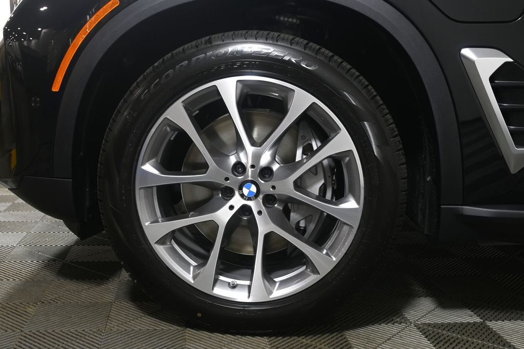 New 2026 Black Sapphire Metallic BMW xDrive50e image 11