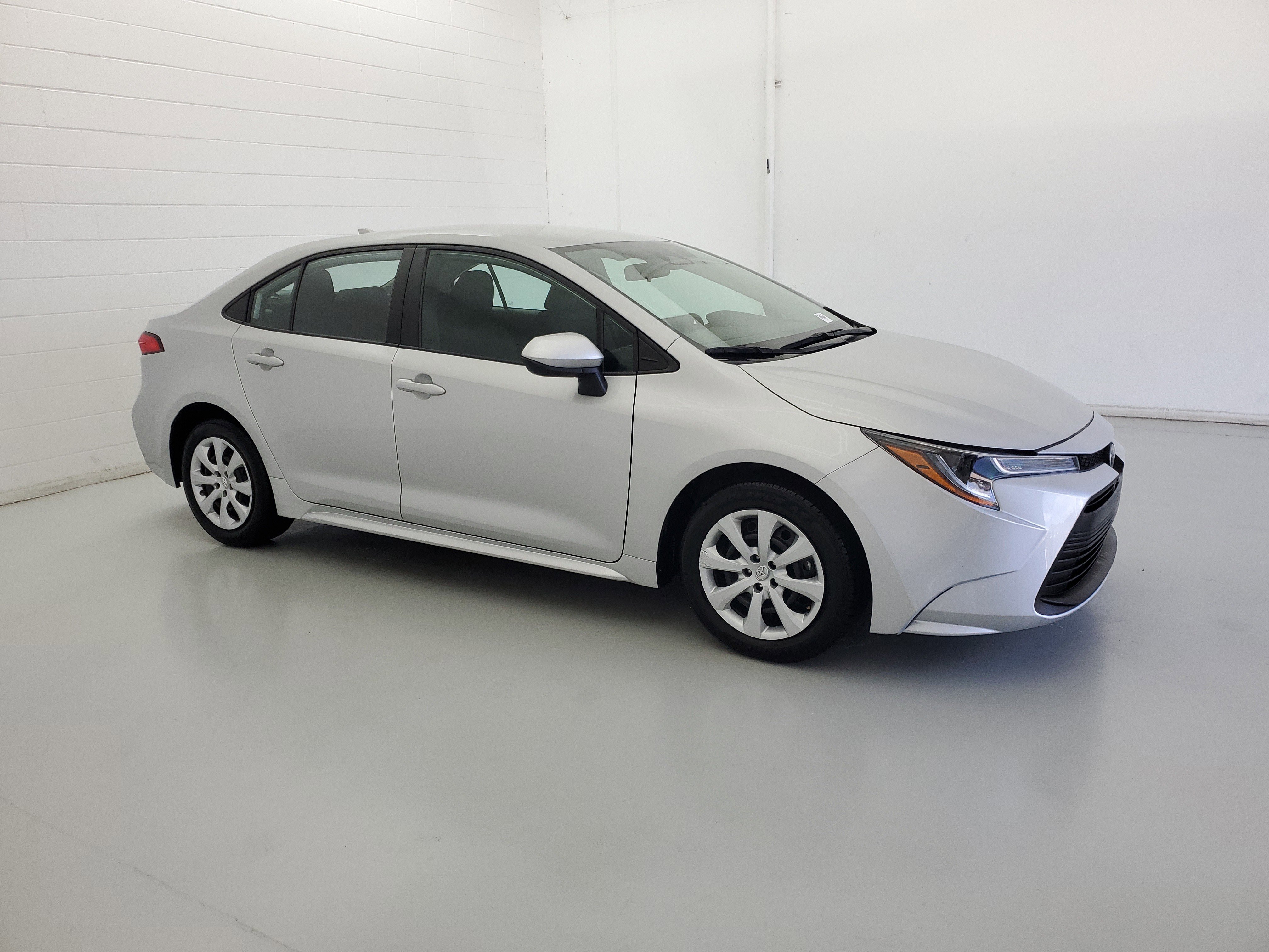 Used 2024 Classic Silver Metallic Toyota LE image 4