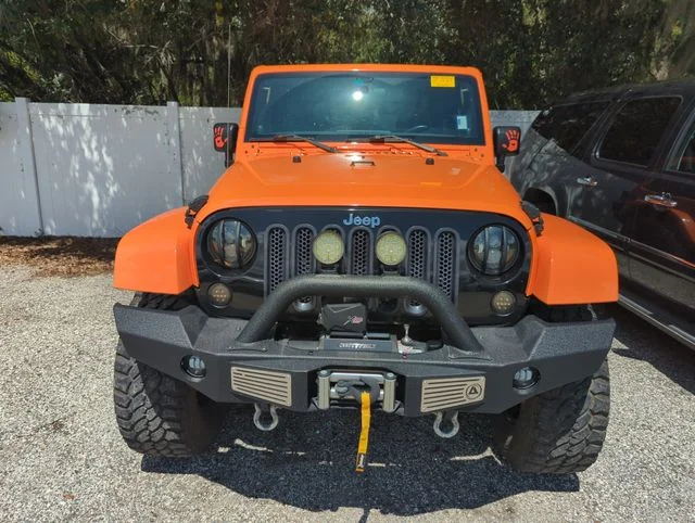Used 2012 Orange Jeep Sahara image 5