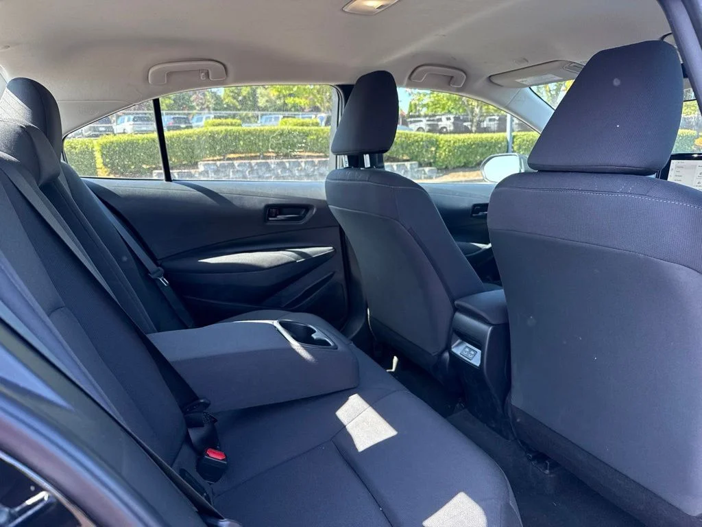 Used 2024 Midnight Black Metallic Toyota LE image 19