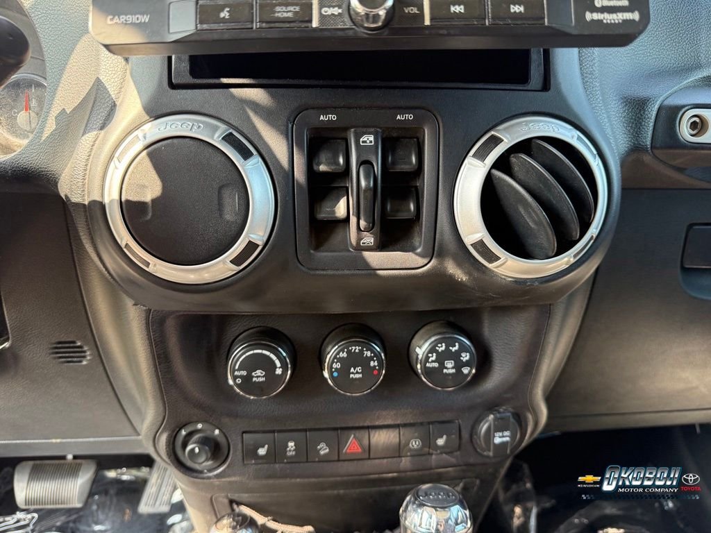 Used 2015 White Jeep Unlimited Sahara image 13