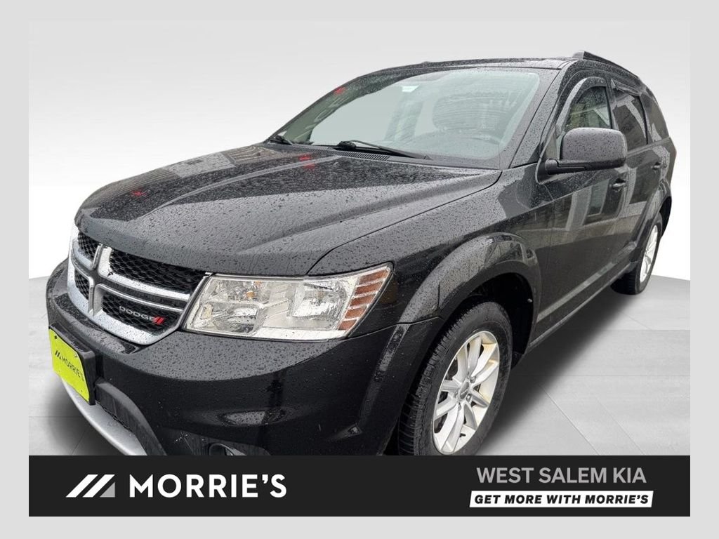 Used 2016 Black Dodge SXT image 1