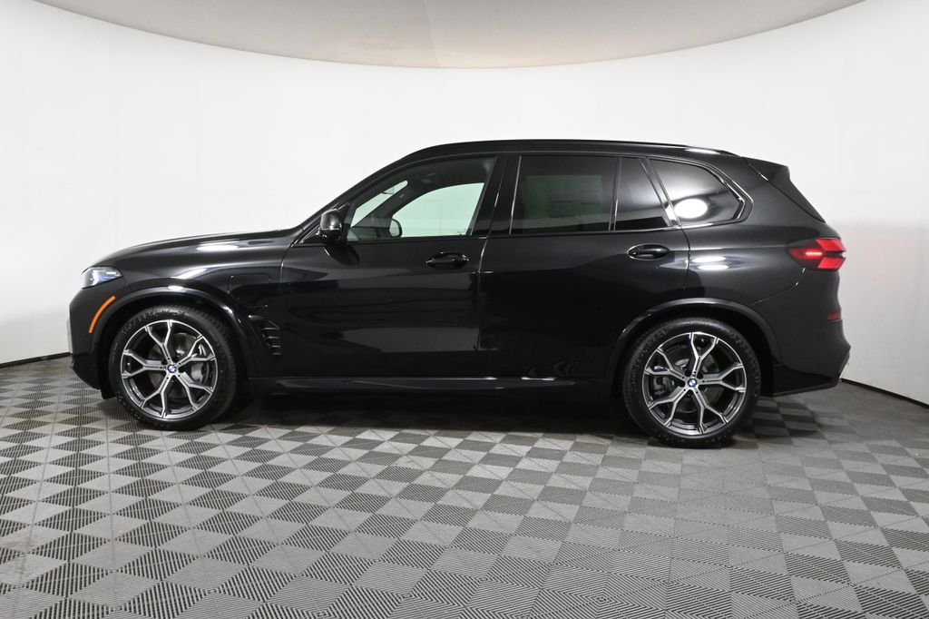 Used 2026 Black BMW xDrive50e image 2