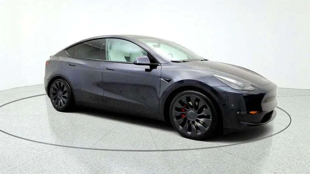 Used 2024 Stealth Grey Tesla Performance AWD w/ White & Black Interior image 3