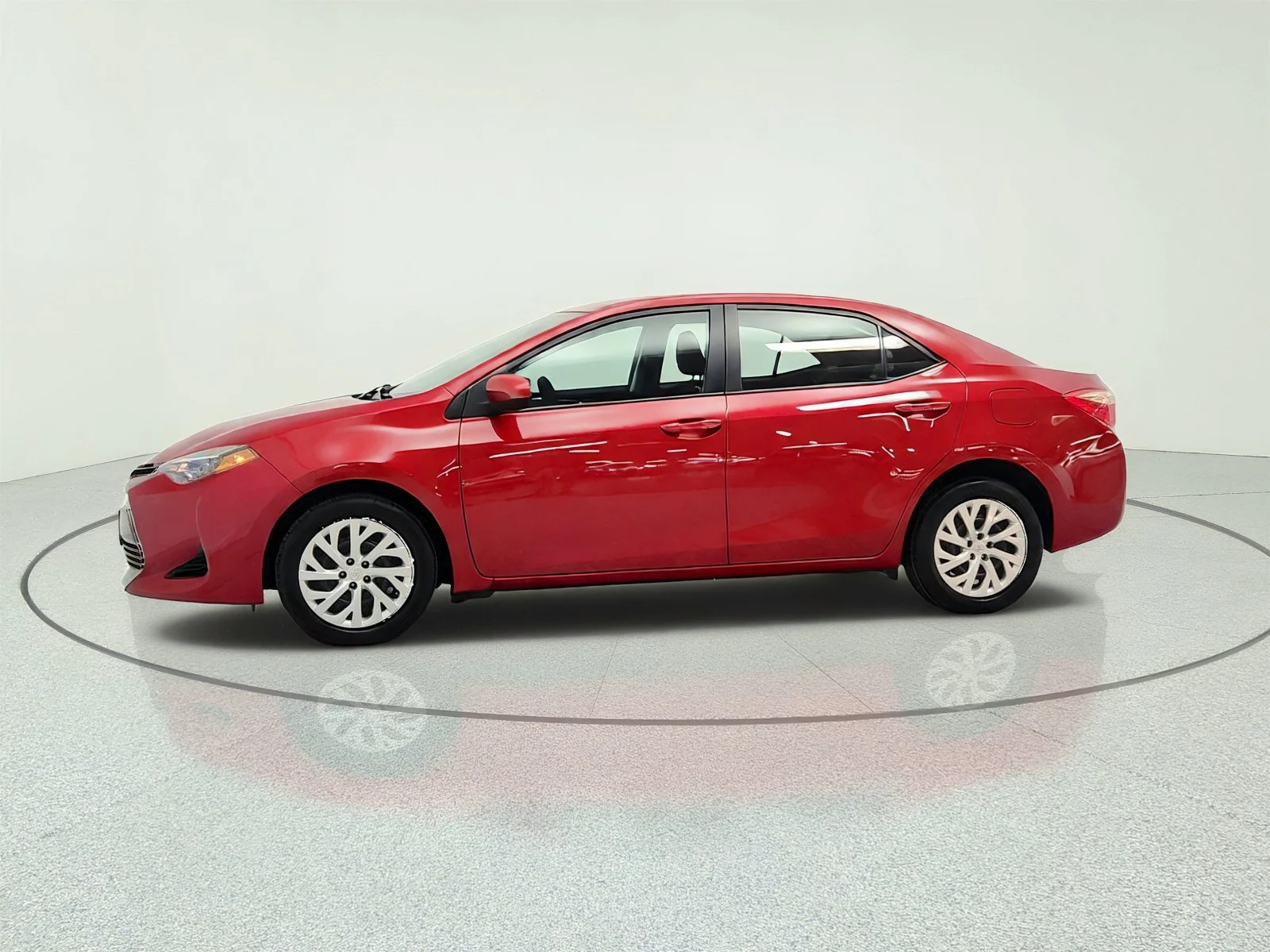 Used 2017 Barcelona Red Metallic Toyota LE image 8