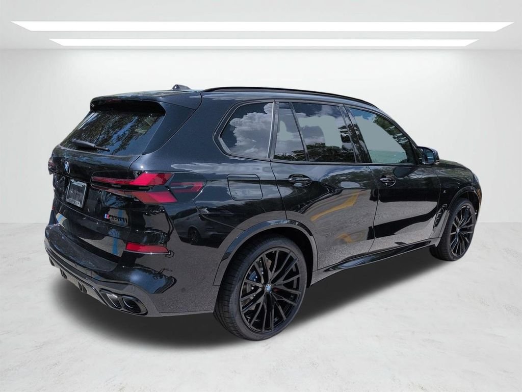 New 2026 Black Sapphire Metallic BMW M60i image 4