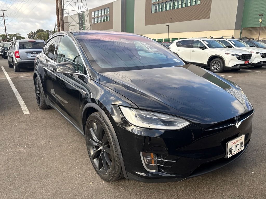Used 2018 Solid Black Tesla 75D image 4