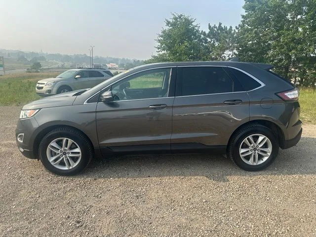 Used 2017 Ford Edge SEL with VIN 2FMPK4J92HBC30271 for sale in Manistee, MI