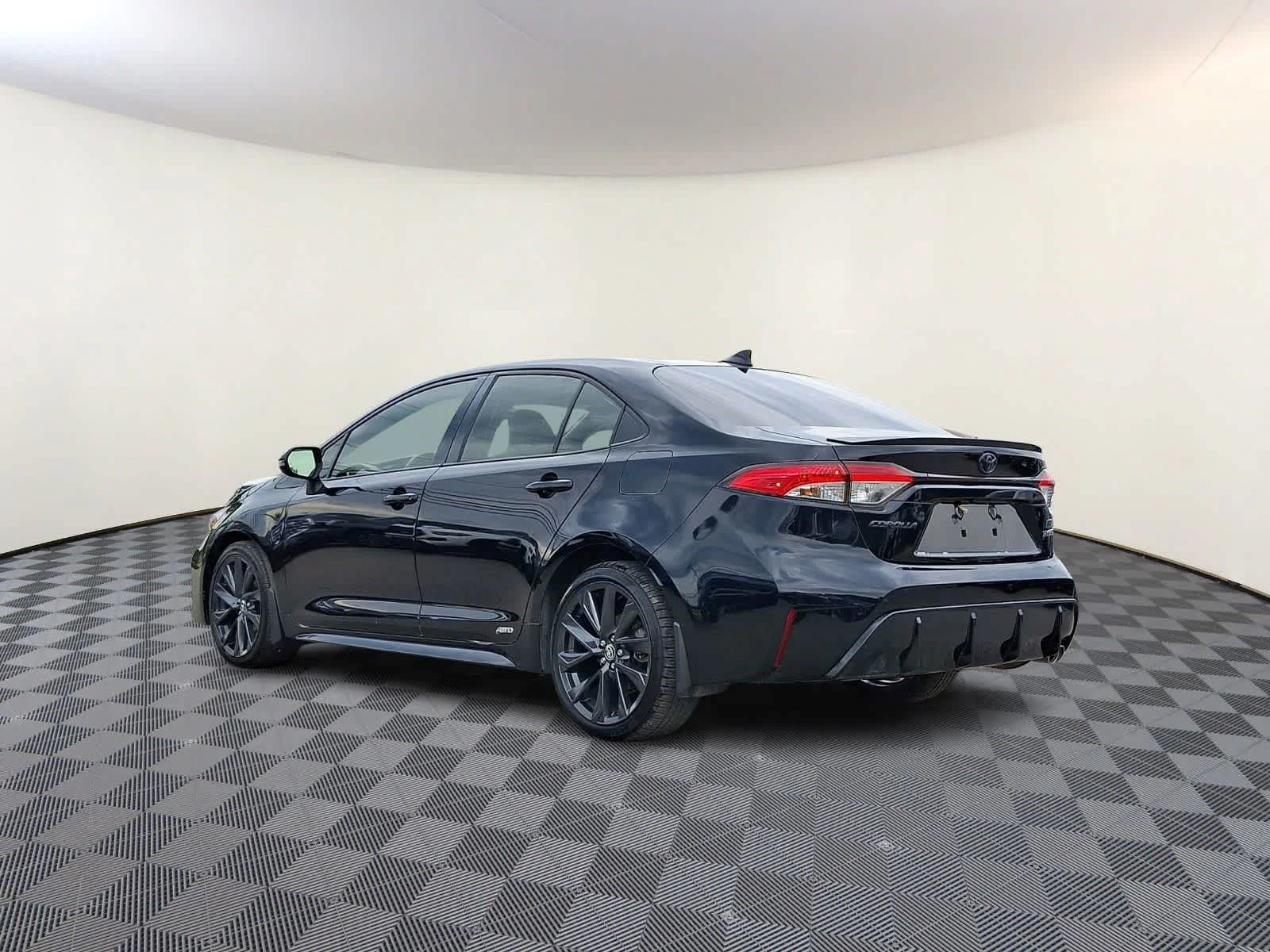 Used 2024 Midnight Black Metallic Toyota Hybrid SE image 9