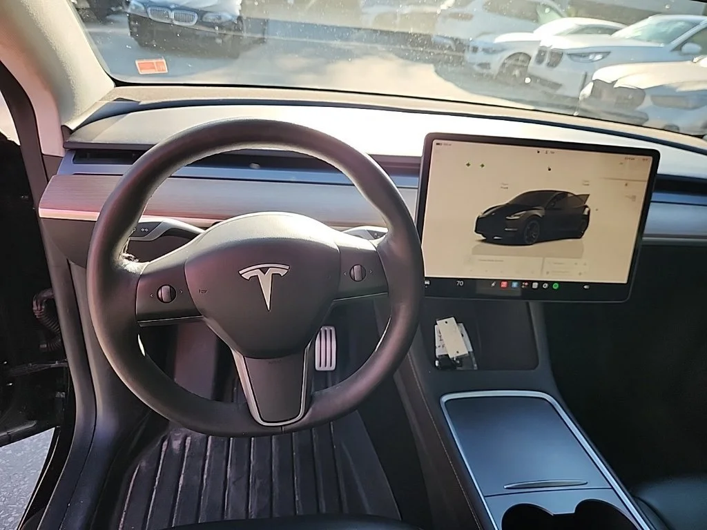 Used 2022 Solid Black Tesla Performance image 4