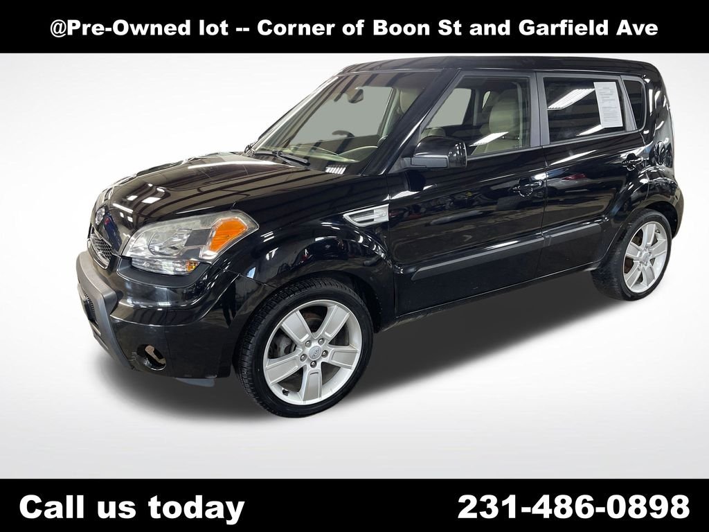 Used 2011 Gray Kia Exclaim image 1