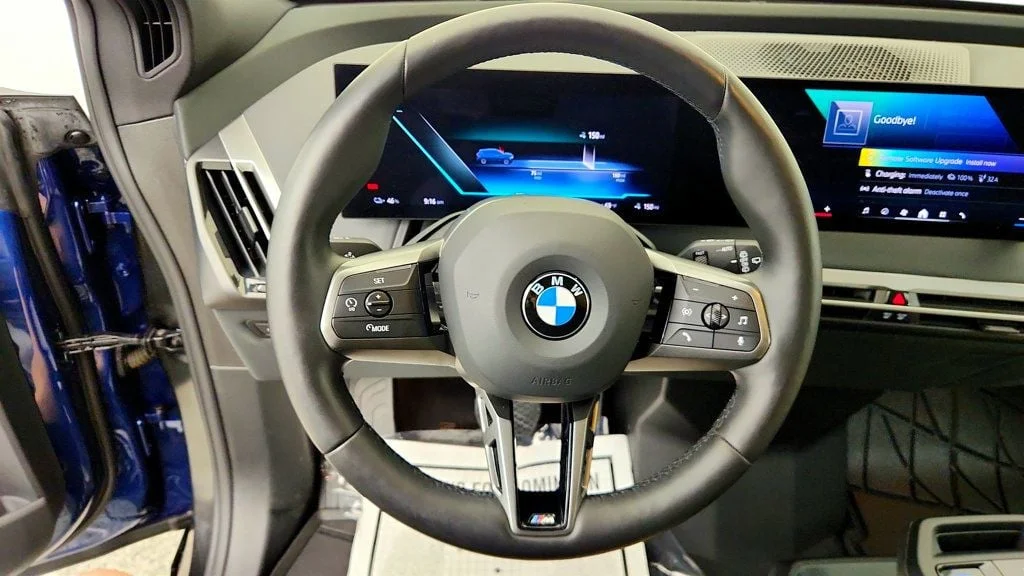 Used 2025 Phytonic Blue Metallic BMW xDrive50 SAV w/ Sport Package & Driving Assist Pro image 13