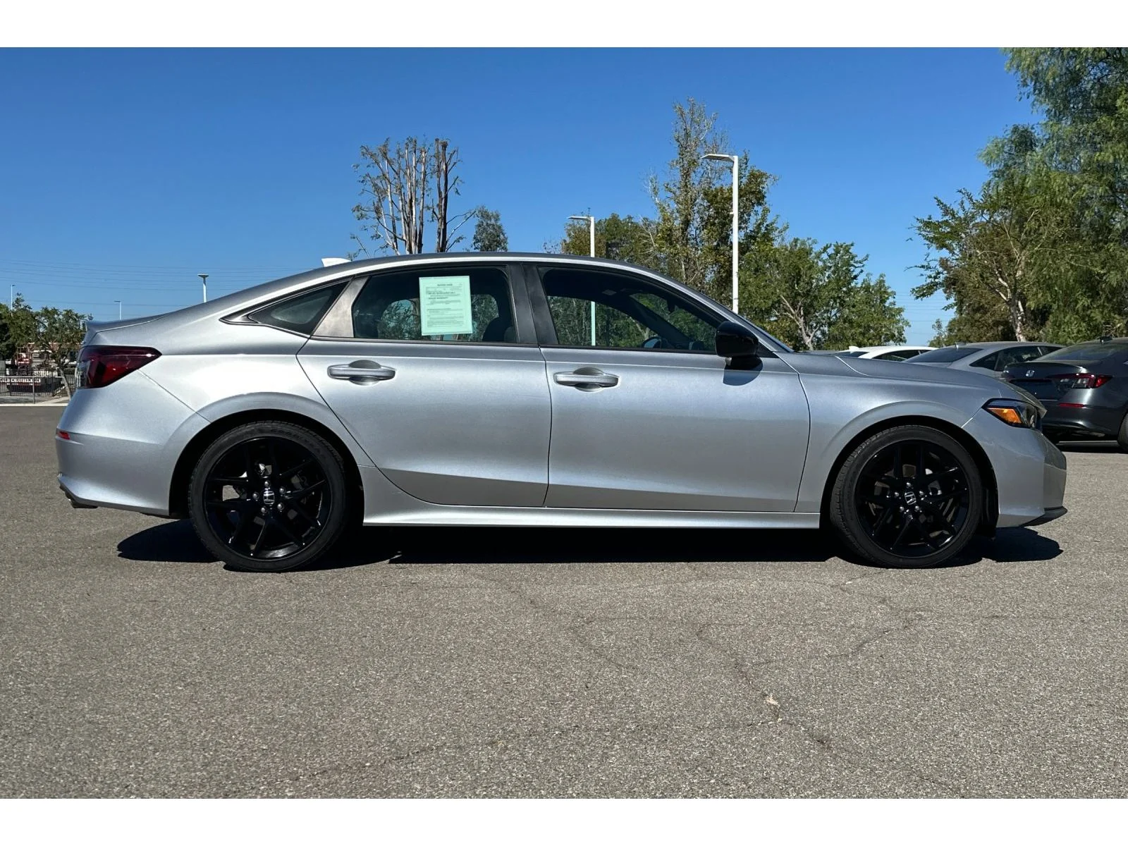 Used 2025 Solar Silver Metallic Honda Sport image 7